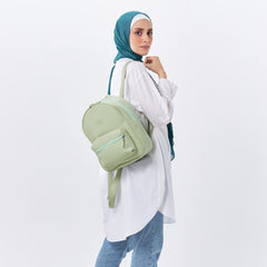 حقيبة ظهر صغيرة من الجلد باللون الأخضر النعناعي
