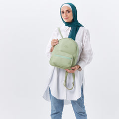 حقيبة ظهر صغيرة من الجلد باللون الأخضر النعناعي